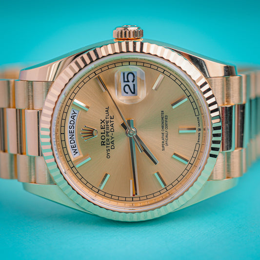 Rolex Day-date 36mm champagne dial 128238