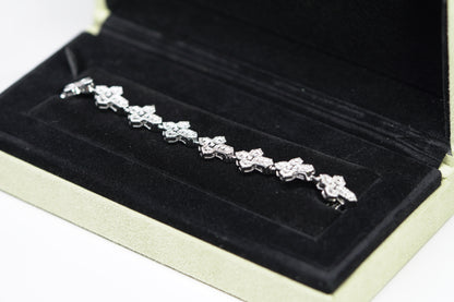 10KT 3.50CT DIAMONDCROSSBAGUETTE BRACELET WG