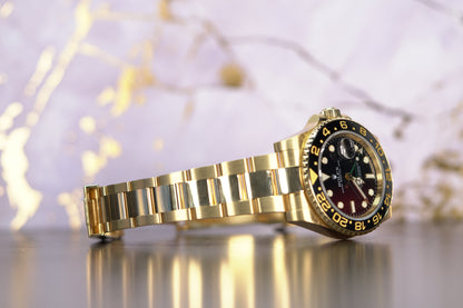 Rolex GMT Master II Yellow Gold 40mm Black Oyster Papers 116718LN