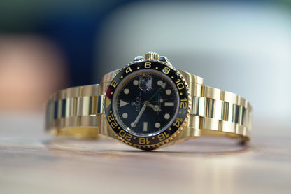 Rolex GMT Master II Yellow Gold 40mm Black Oyster Papers 116718LN