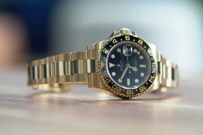 Rolex GMT Master II Yellow Gold 40mm Black Oyster Papers 116718LN